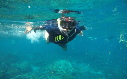 Private Snorkeling Adventure in Manta Bay and Diamond Beach with Lunch Included